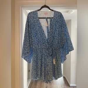 Blue and white romper with tie.